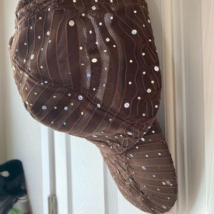 Like New Lightweight breathable fashion cap with rhinestones. Adjustable velcro.